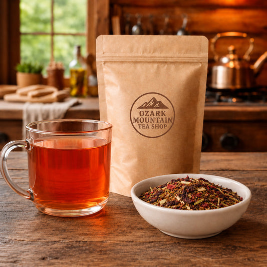 Hiker's Delight brewed tea, loose tea ingredients, and Ozark Mountain Tea Shop brown packaging