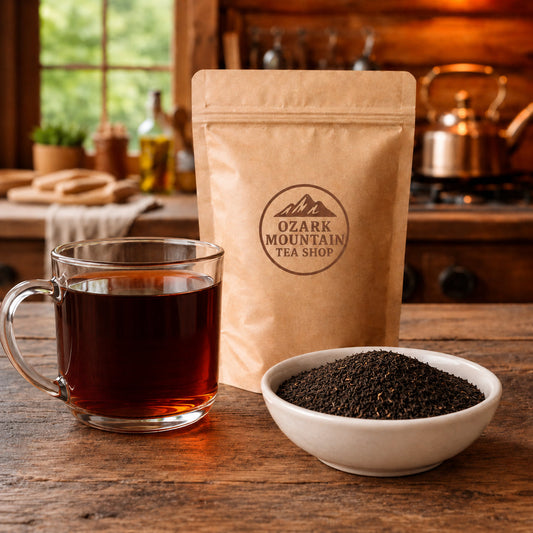 Irish Breakfast brewed tea, loose tea ingredients, and Ozark Mountain Tea Shop brown packaging