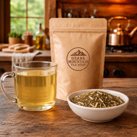 Mountain Grass brewed tea, loose tea ingredients, and Ozark Mountain Tea Shop brown packaging