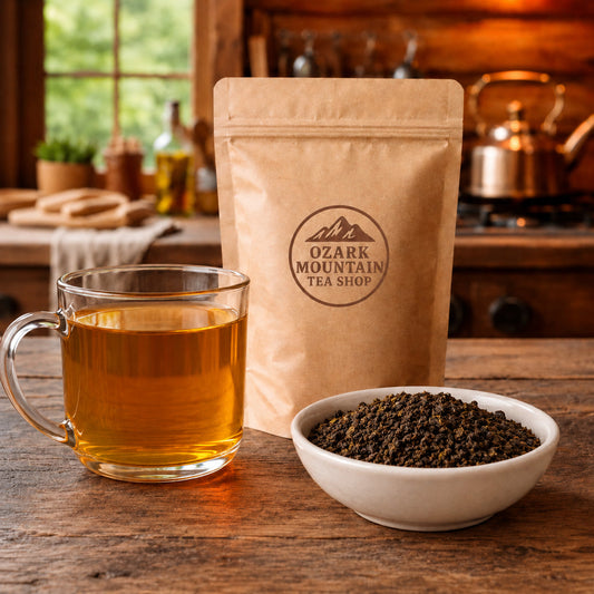 Smoked Oak Oolong brewed tea, loose oolong leaves, and Ozark Mountain Tea Shop brown packaging